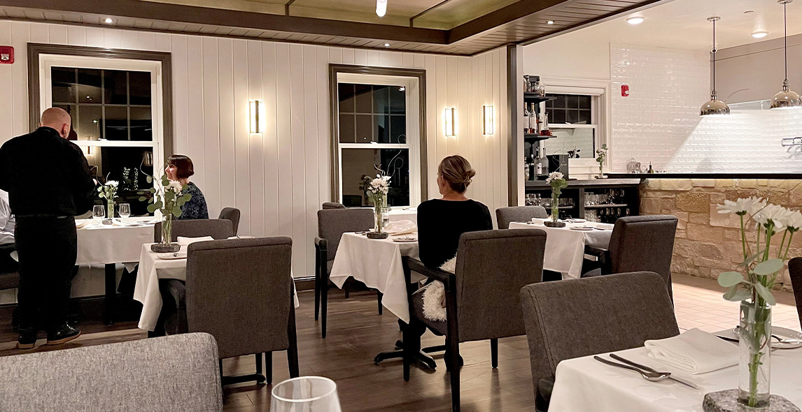 Guests dining in the Opus restaurant